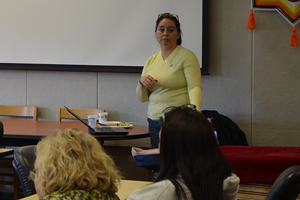 Woman presenting at a Lunch & Learn.