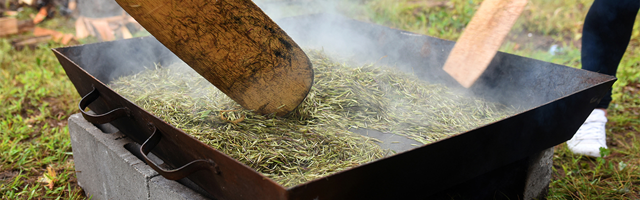 People posing for a picture at Leech Lake Tribal College.